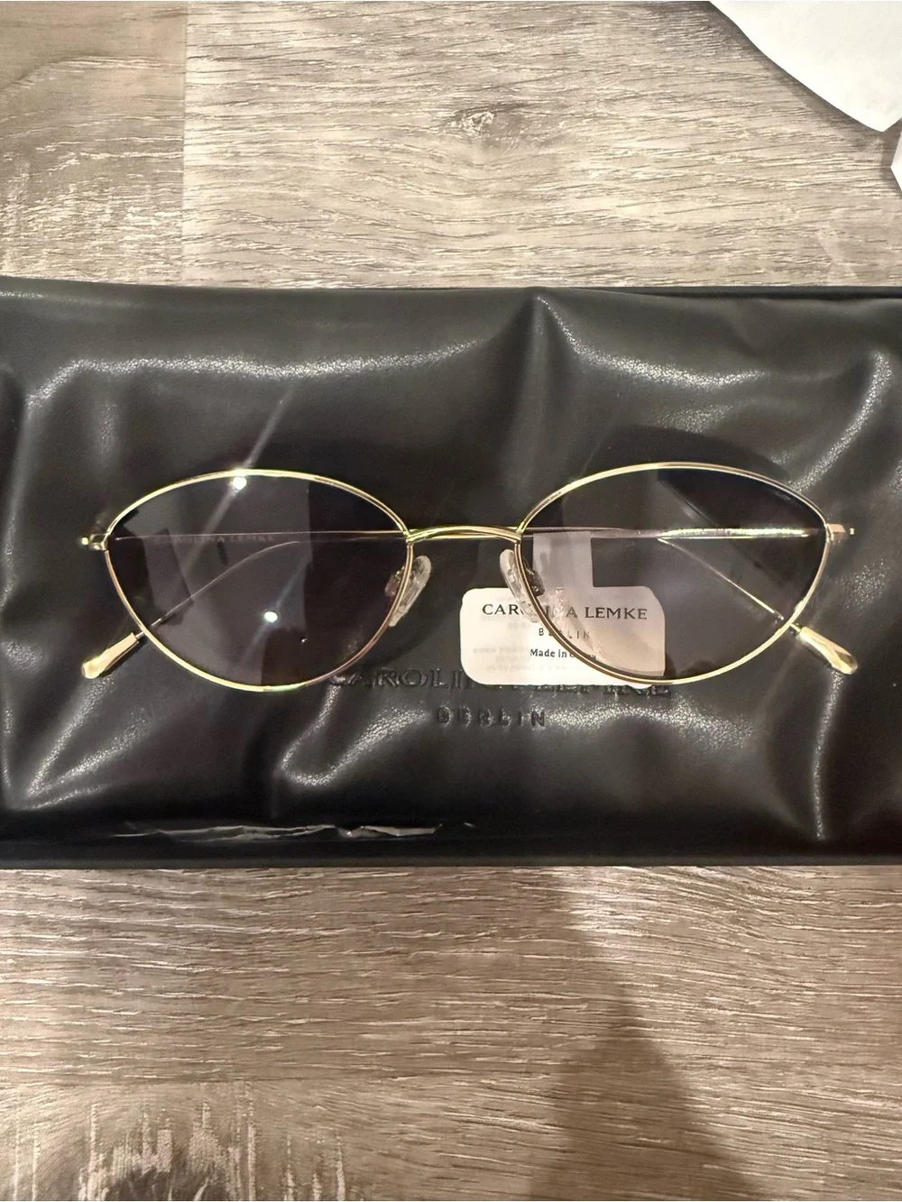 Carolina lemke Gold Oval Sunglasses with Gray gradient Tinted Lenses